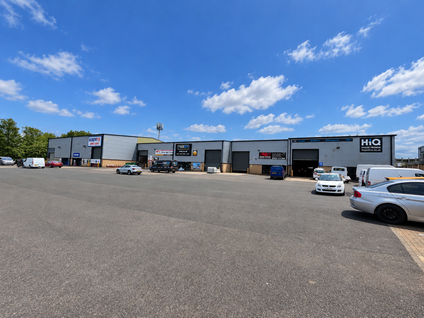 Abbey Park trade park frontage in Mansfield, seen across the vehicle yard